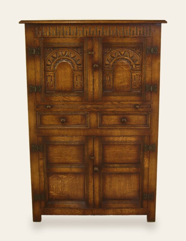 Carved drinks cabinet, front view — handmade by Bryn Hall in Suffolk