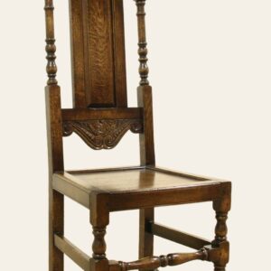 Carved panel back single chair 524, angle view — handmade by Bryn Hall in Suffolk