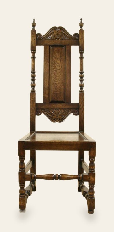 Carved panel back single chair 524, front view — handmade by Bryn Hall in Suffolk