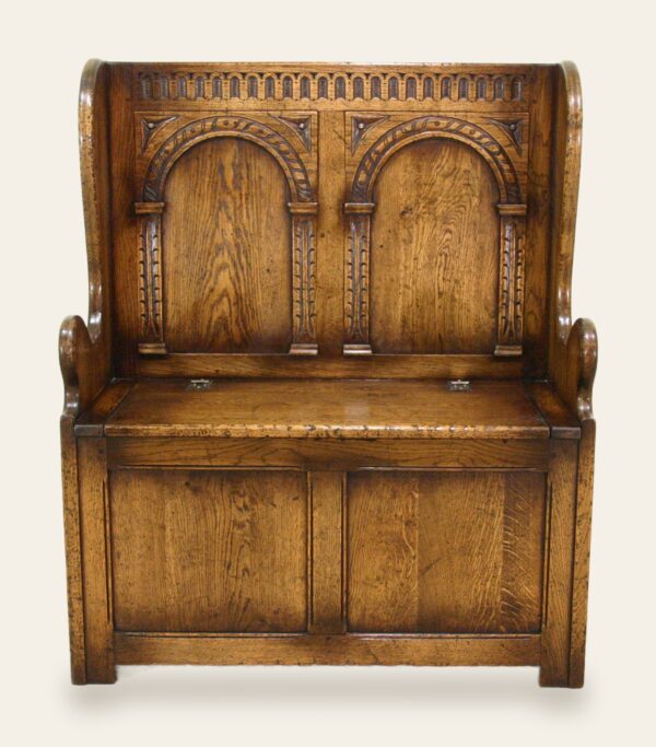 Carved settle, front view — handmade by Bryn Hall in Suffolk