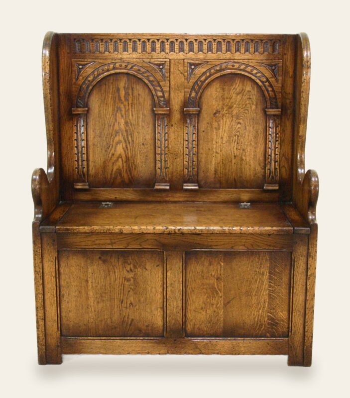 Carved settle, front view — handmade by Bryn Hall in Suffolk