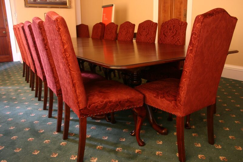 A twin-pedestal boardroom table with upholstered Queendale chairs, made for E’On
