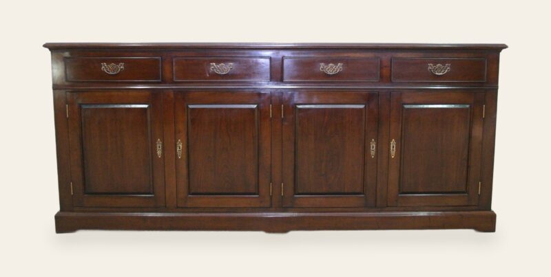 Four drawer door dresser base cherry, front view — handmade by Bryn Hall in Suffolk