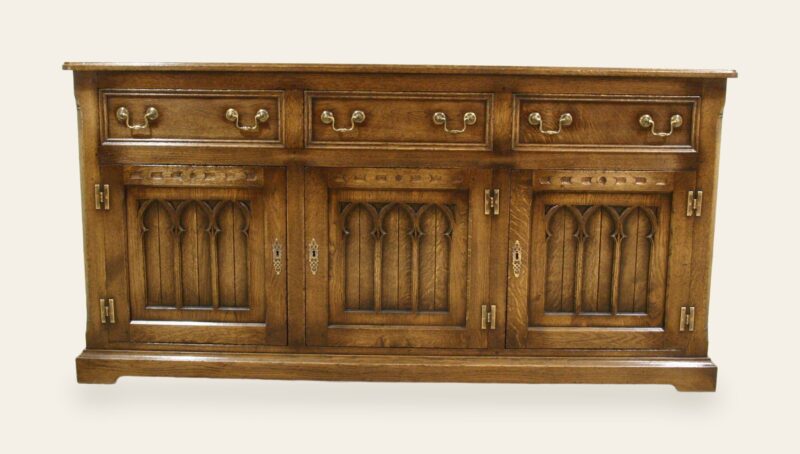 Gothic dresser base three drawers, front view — handmade by Bryn Hall in Suffolk