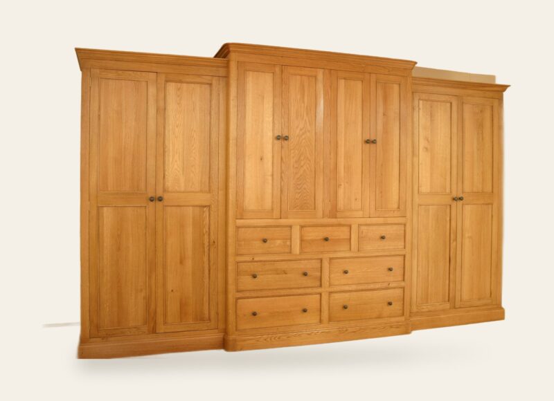 Large brakefront wardrobe 8 doors and 7 drawers, view 1 — handmade by Bryn Hall in Suffolk