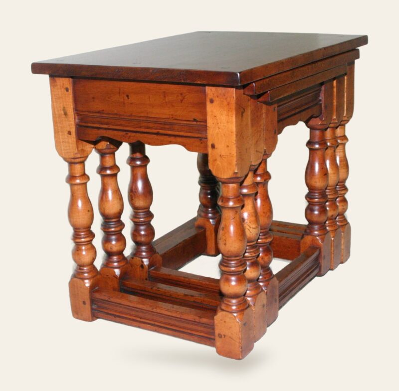 Nest of table 721, angle view cherry — handmade by Bryn Hall in Suffolk