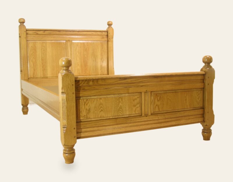 Paneled bed 928, angle view — handmade by Bryn Hall in Suffolk