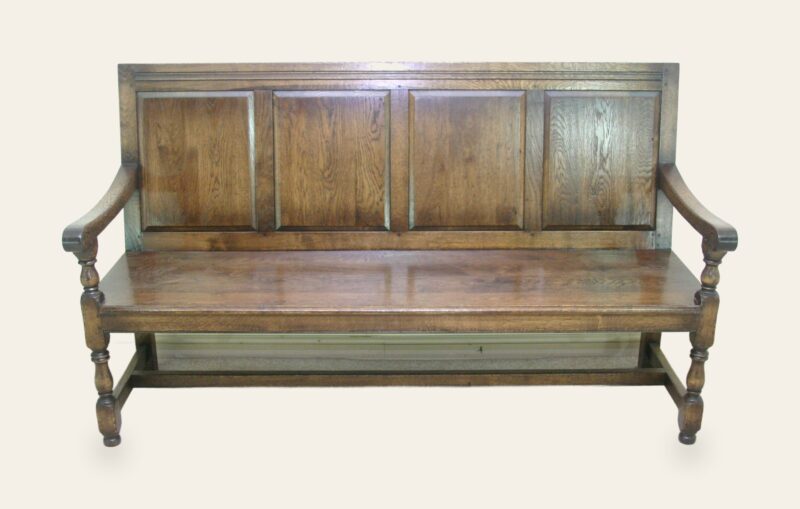 Panelled bench settle 971, front view — handmade by Bryn Hall in Suffolk