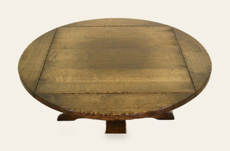 Single pedestal coffee table with drop leafs, view 1 — handmade by Bryn Hall in Suffolk