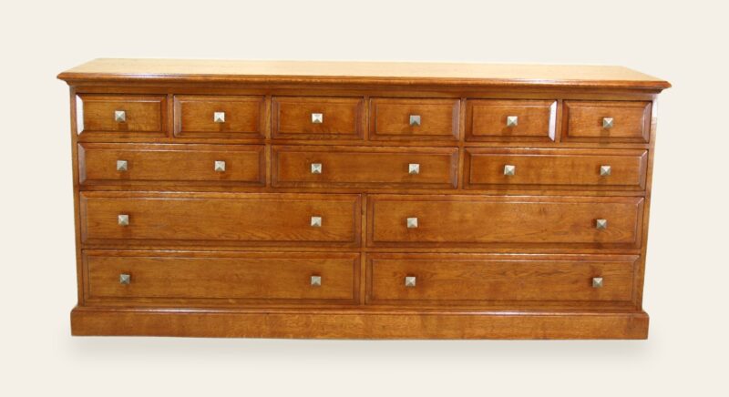 Thirteen drawer chest of drawers, front view — handmade by Bryn Hall in Suffolk