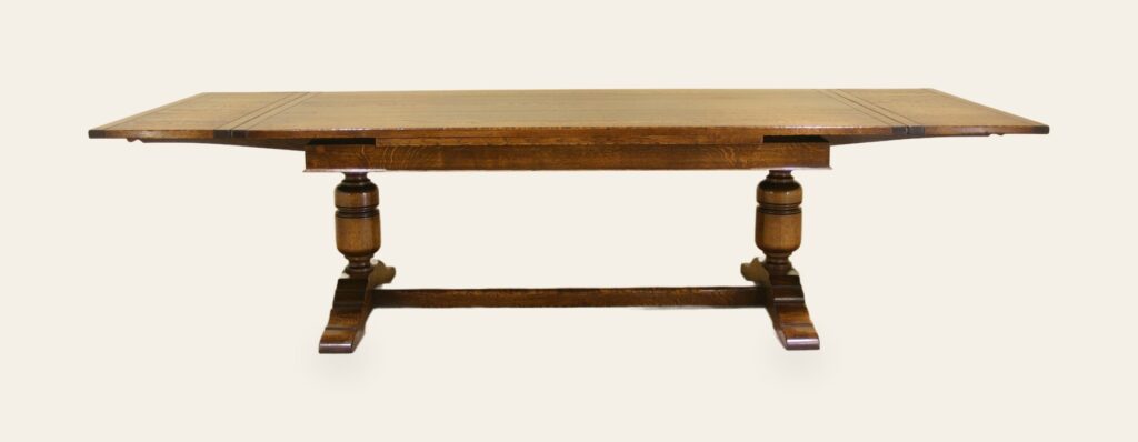 A drawleaf table seen from the side with leaves stowed