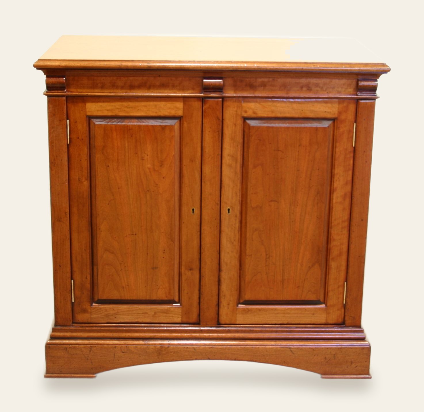 Two door cherry cabinet, front view — handmade by Bryn Hall in Suffolk