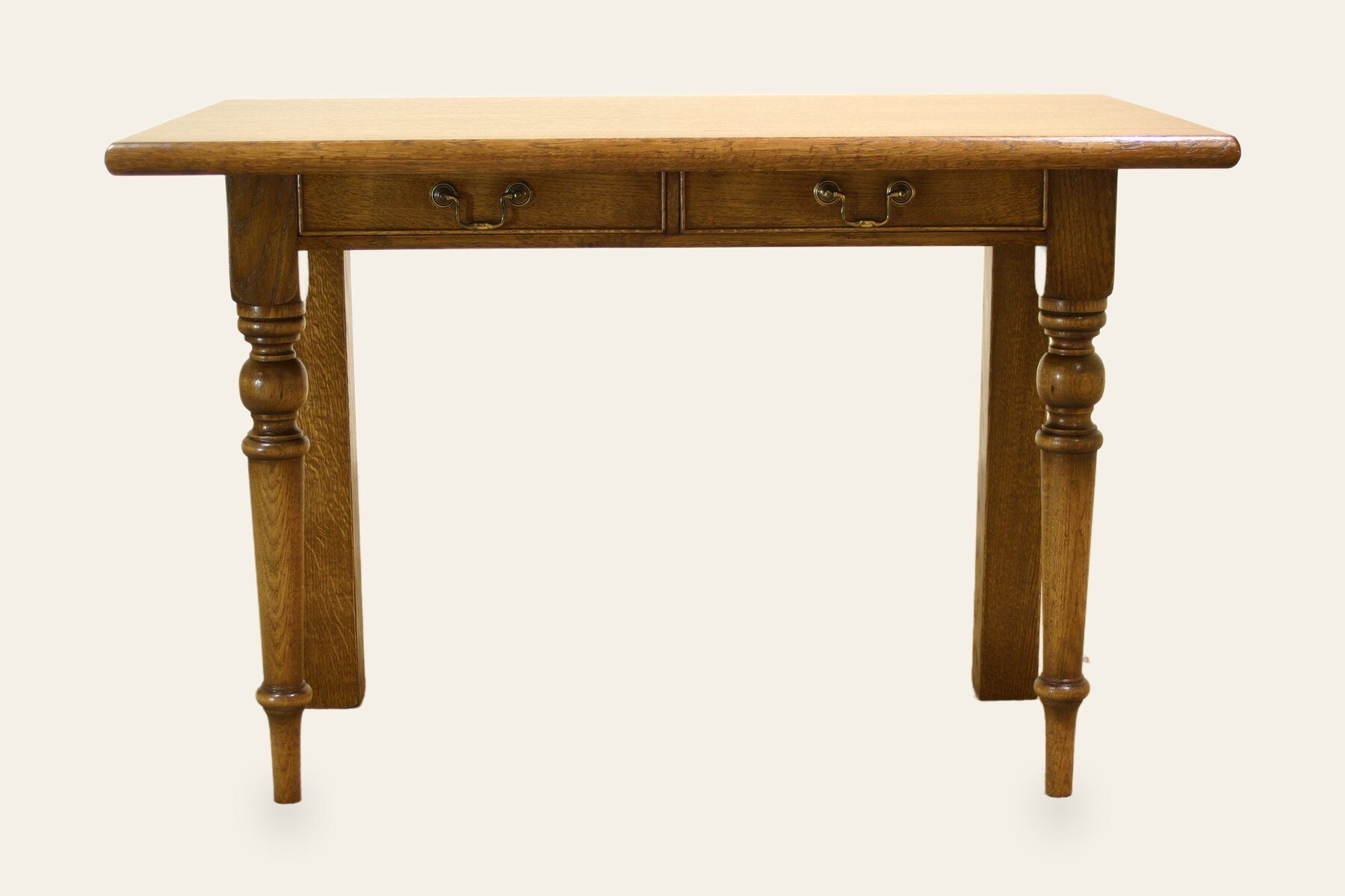 Two drawer hall table turned front legs, front view — handmade by Bryn Hall in Suffolk