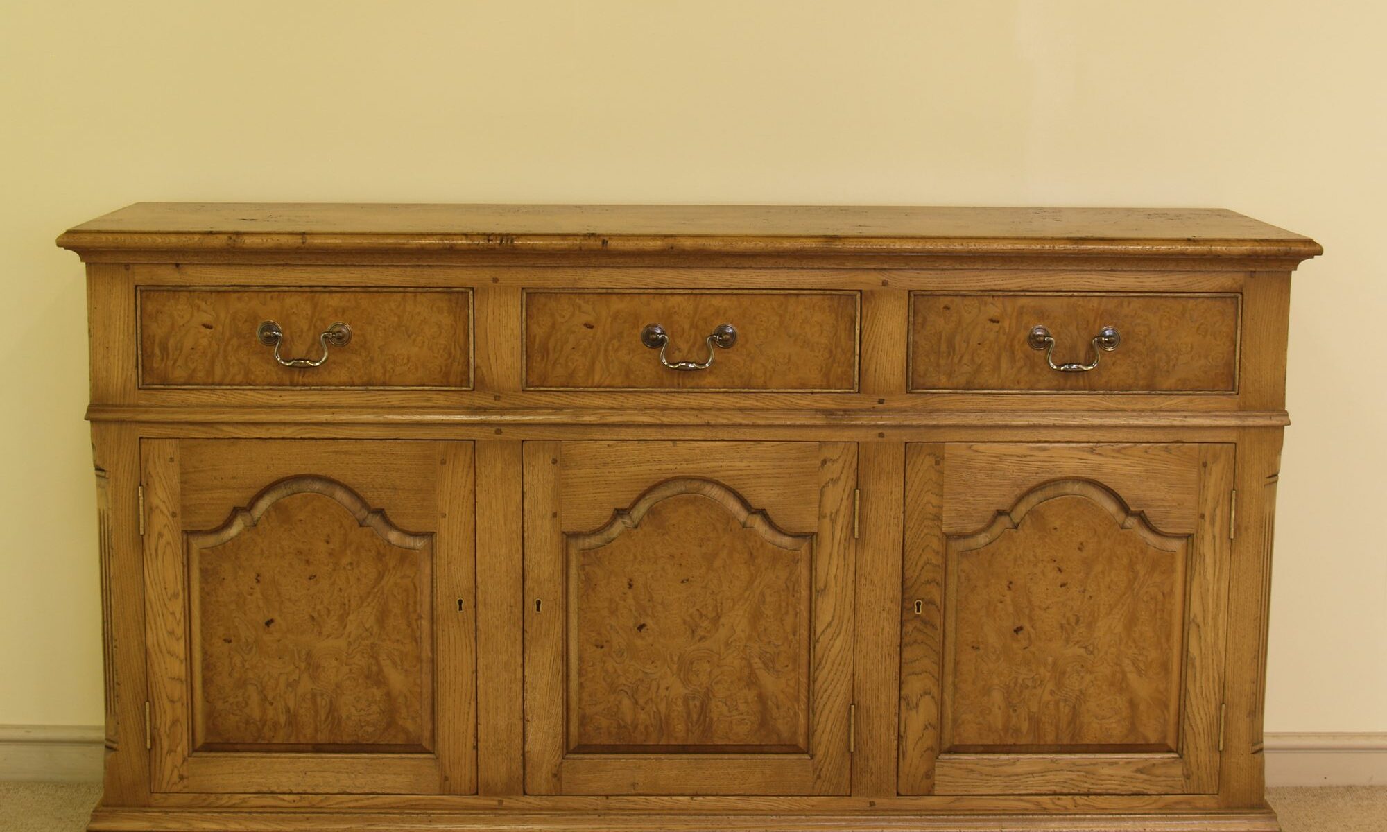 Veneered door and drawer fronts three door drawers dresser base with burr oak top front vi — handmade by Bryn Hall in Suffolk