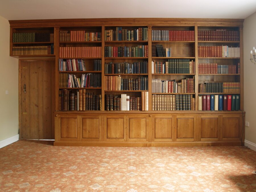 Very large fitted oak bookcase, view 1 — handmade by Bryn Hall in Suffolk