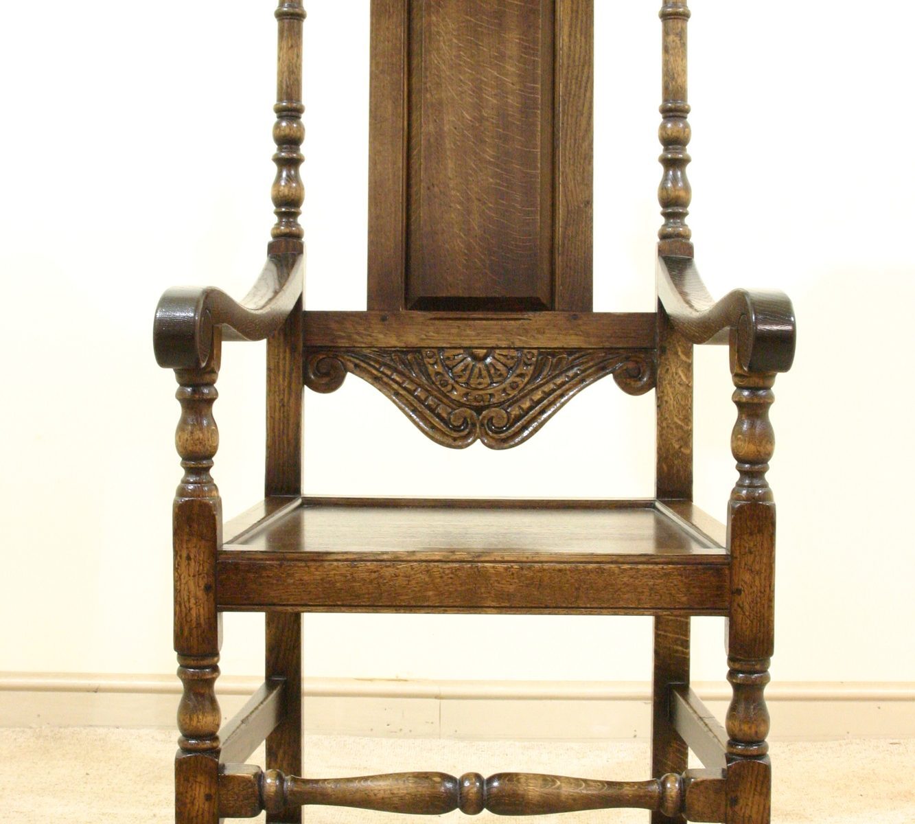 Carved panel back carver chair 525, front view — handmade by Bryn Hall in Suffolk