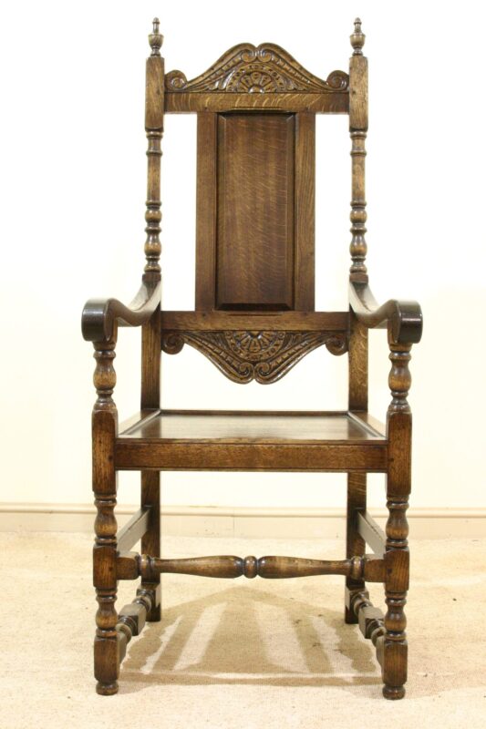 Carved panel back carver chair 525, front view — handmade by Bryn Hall in Suffolk