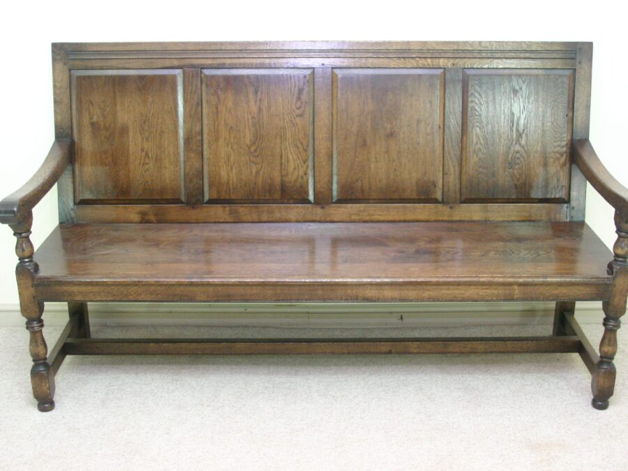 Panelled bench settle 971, front view — handmade by Bryn Hall in Suffolk