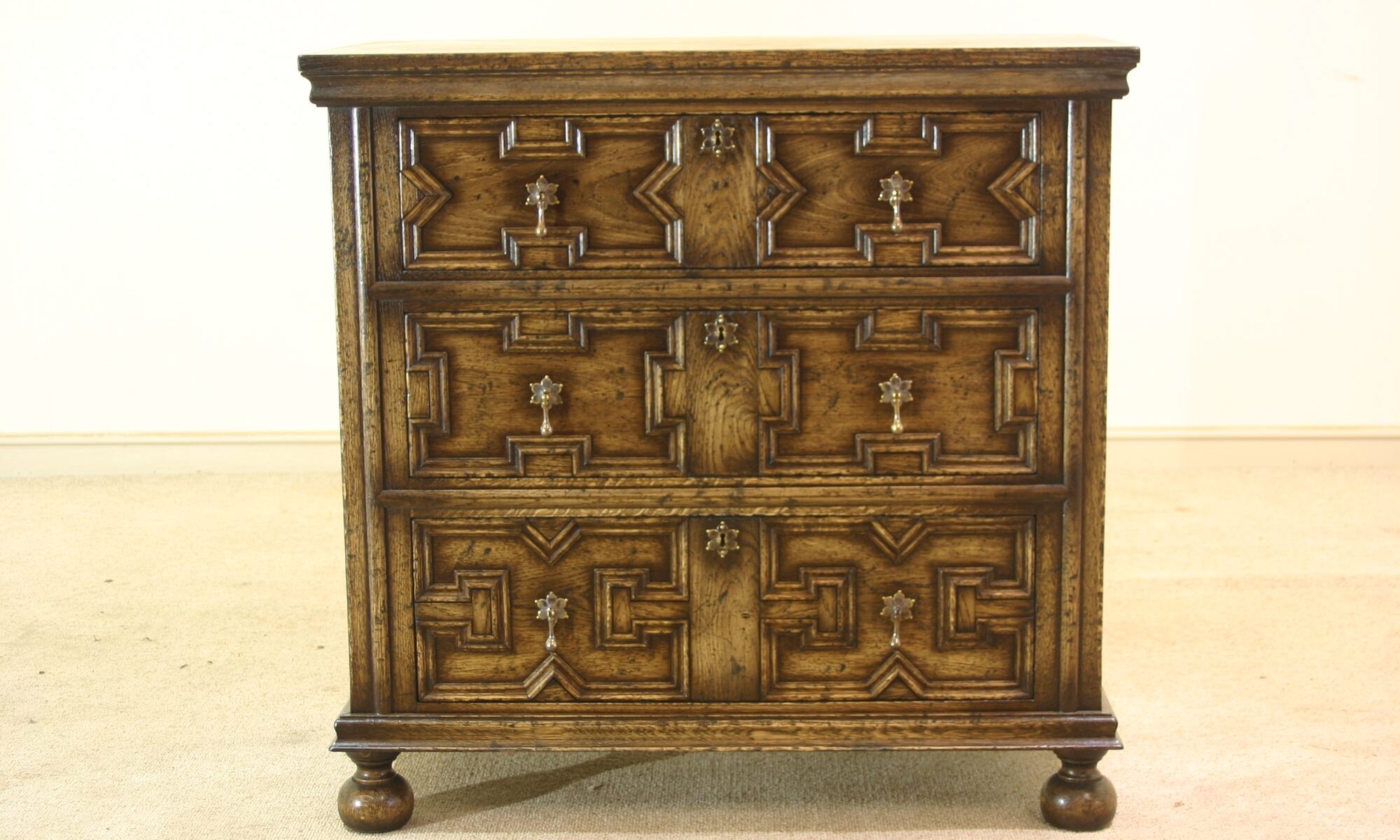 Moulded front chest of drawers 978, front view — handmade by Bryn Hall in Suffolk