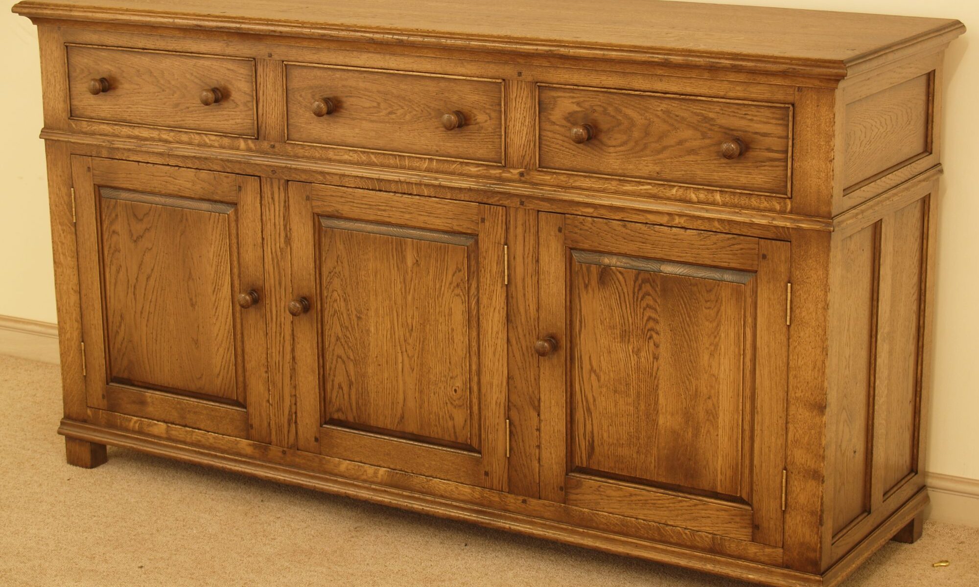 Denbigh dresser base 210, angle view — handmade by Bryn Hall in Suffolk