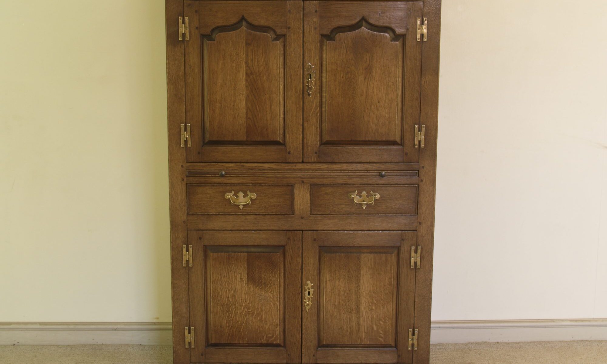 Drinks cabinet four door 148, front view — handmade by Bryn Hall in Suffolk