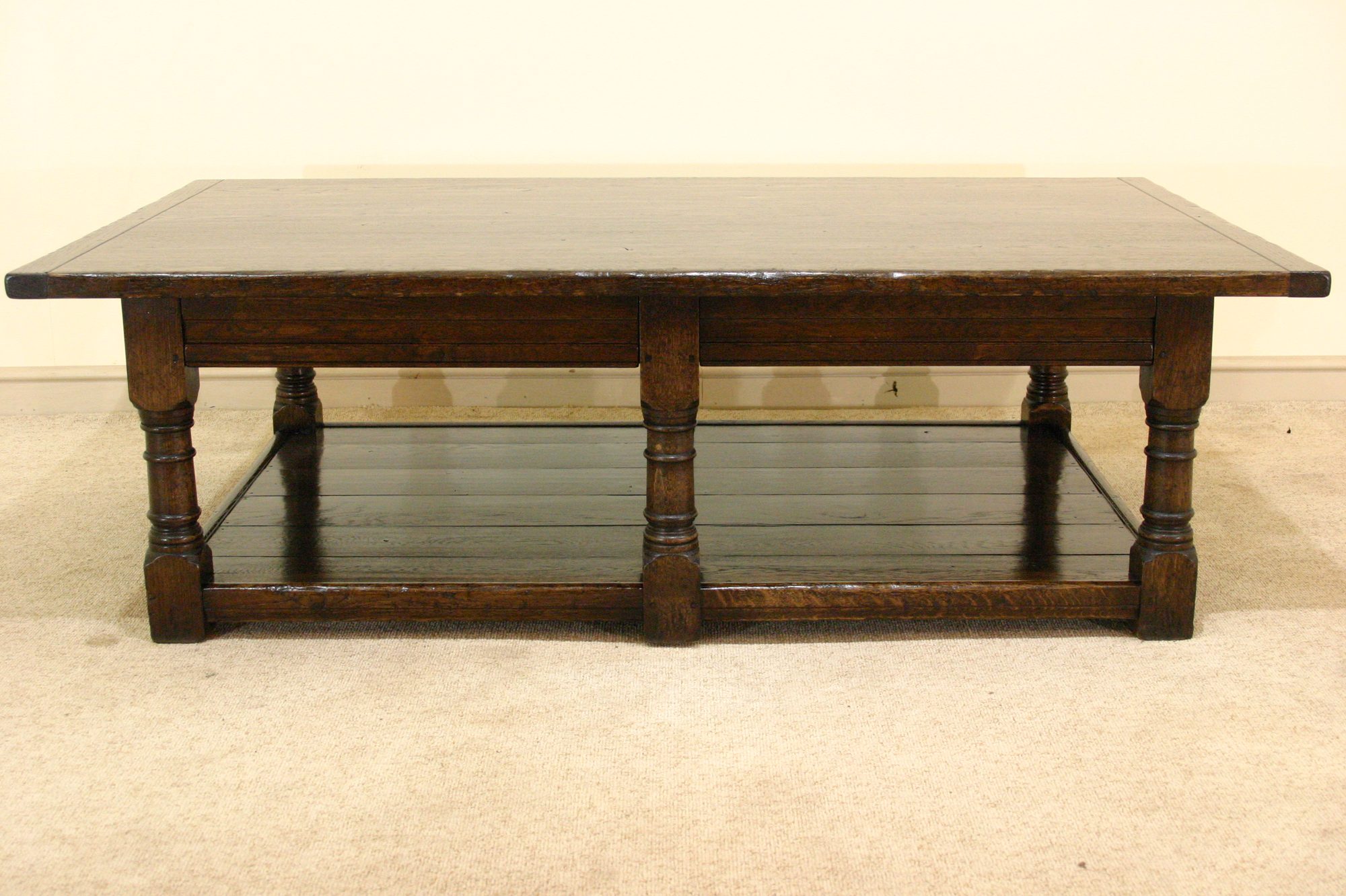 Six leg coffee table with potboard, front view — handmade by Bryn Hall in Suffolk