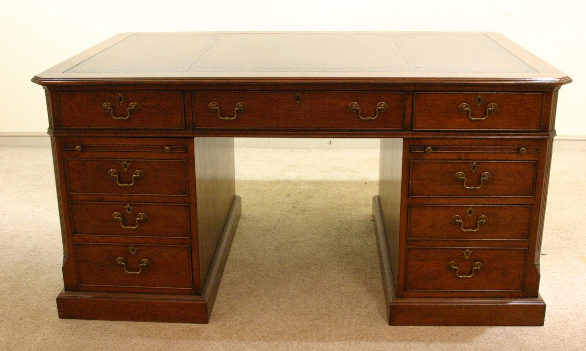 Pedestal desk 901 in cherry, front view — handmade by Bryn Hall in Suffolk