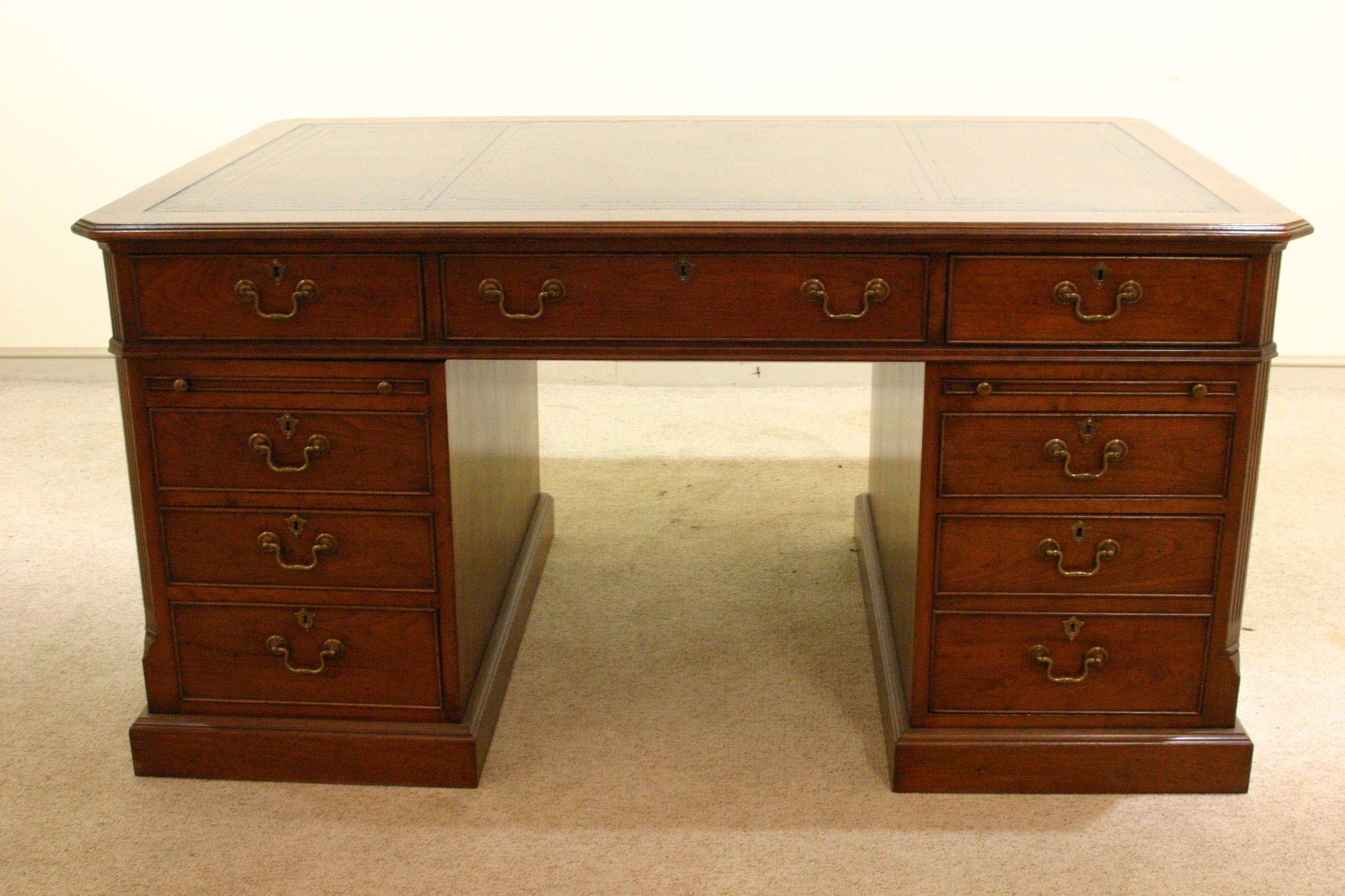 Pedestal desk 901 in cherry, front view — handmade by Bryn Hall in Suffolk