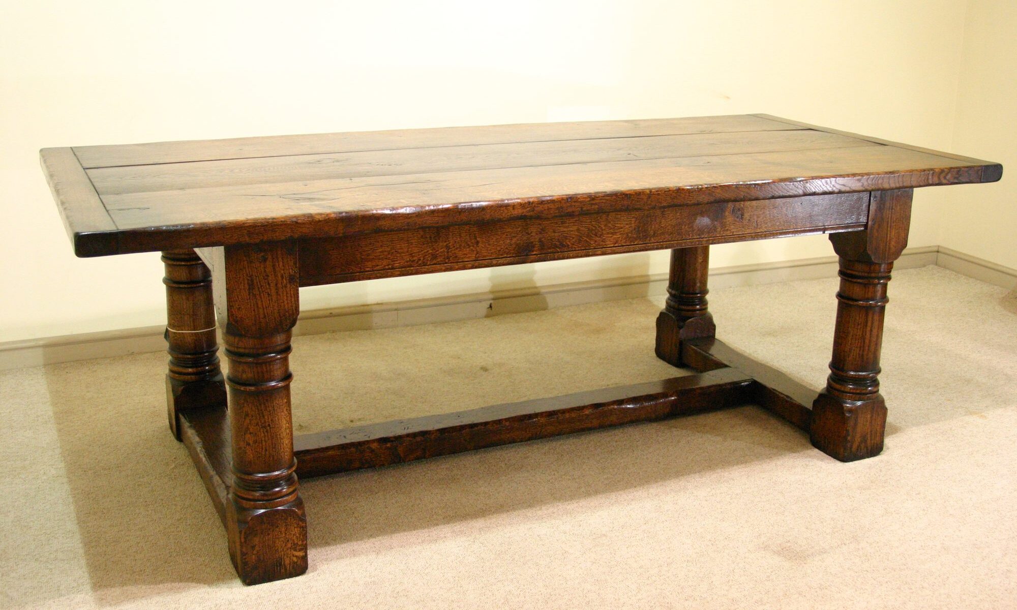 Character oak refectory table 303c, angle view — handmade by Bryn Hall in Suffolk