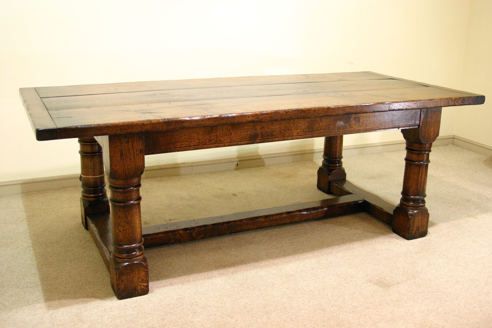Character oak refectory table 303c, angle view — handmade by Bryn Hall in Suffolk