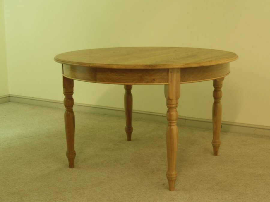 Round kitchen table with two leaves 314a, angle view — handmade by Bryn Hall in Suffolk